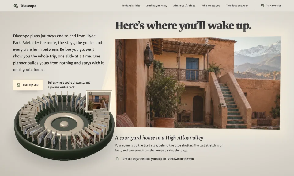 The front page: a courtyard house thrown on a chalk wall beside a round slide tray, the headline above