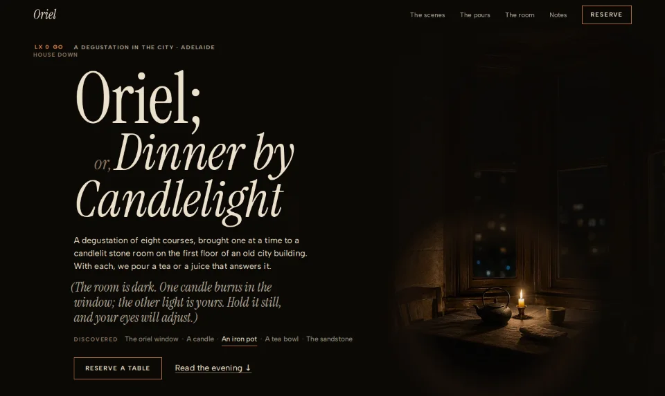 Oriel's front page: a candlelit table in an oriel window in near-darkness, the name set as an old playbill title