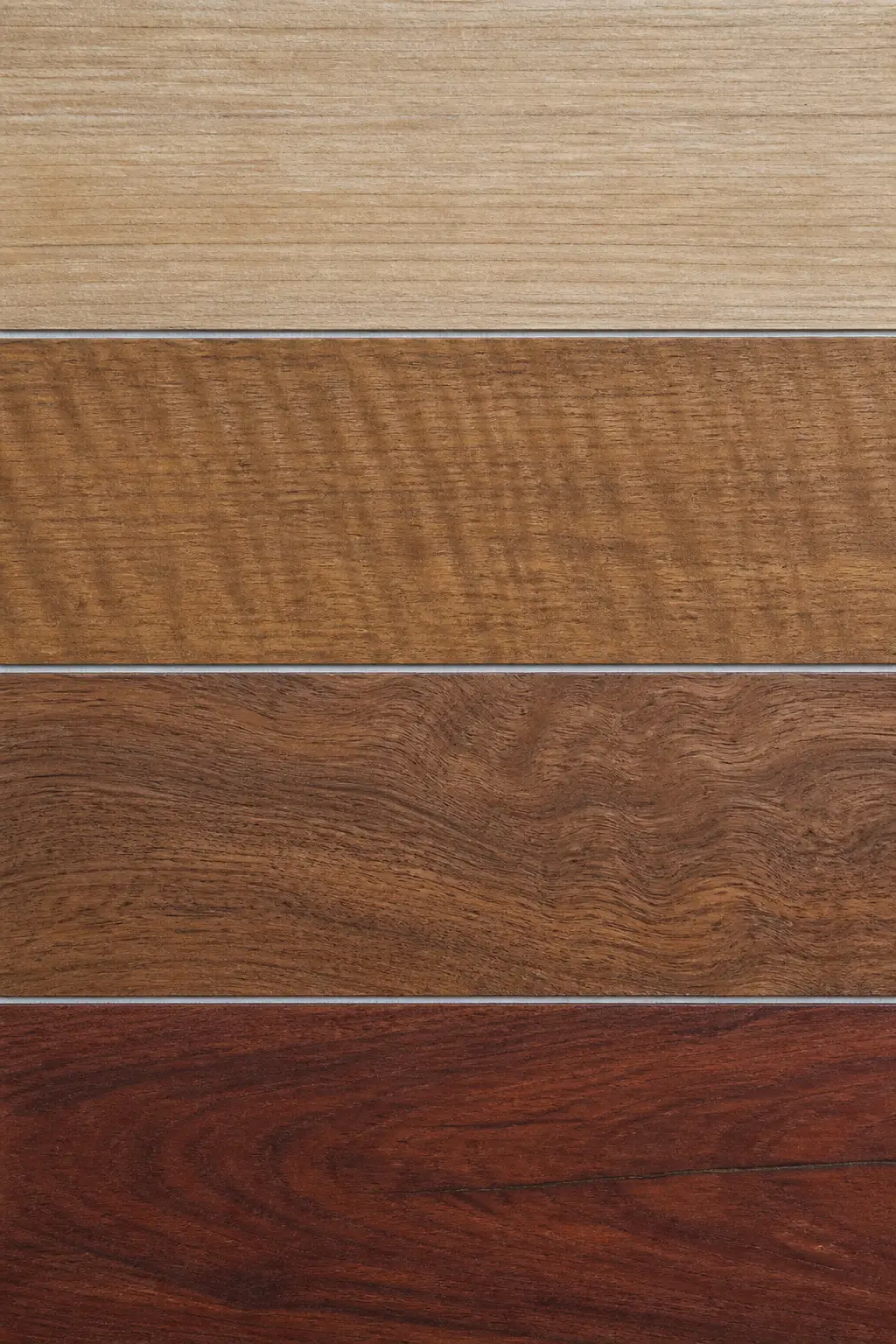 A planed board of Tasmanian oak: pale straw, with fine straight stripes.